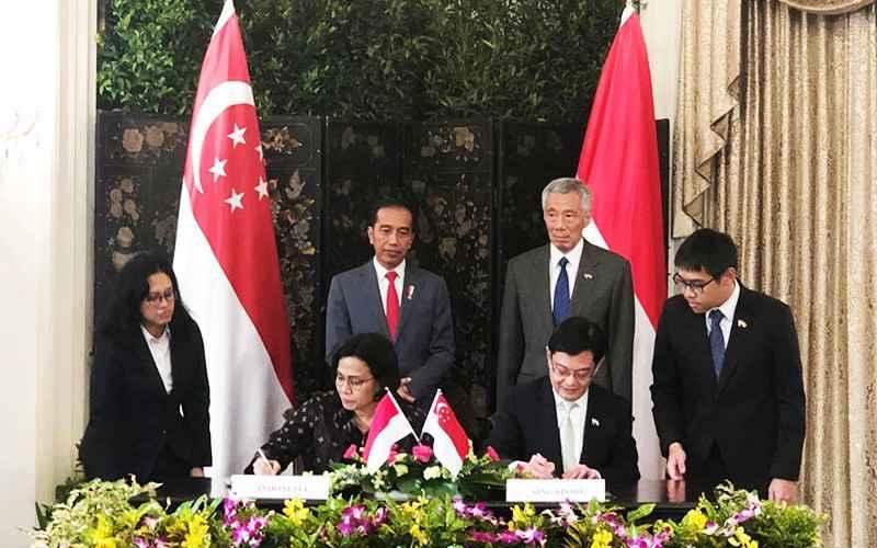 Pantau Ekspor-Impor, Indonesia & Singapura Teken MoU Pertukaran Data